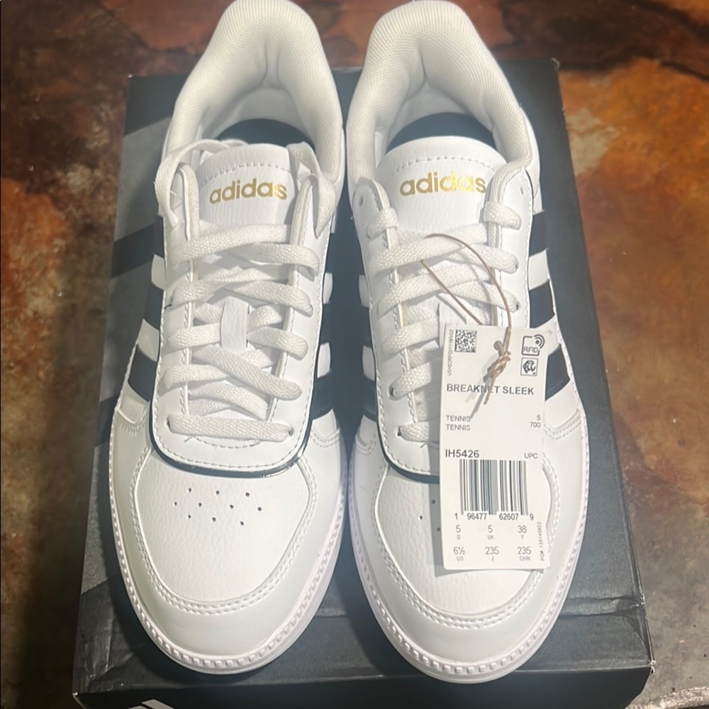 Adidas White and Black Sneakers with Classic Design